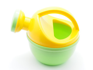 children's watering can on a white background