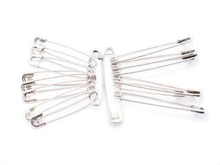pins on a white background