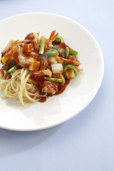 spaghetti seafood and tomato sauce on white dish