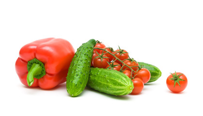 red peppers, cherry tomatoes and cucumbers on a white background