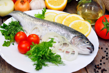 rainbow trout with lemon and fresh vegetables