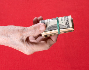 Dollars in woman's hands