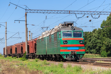 Electric locomotive hauling a grain train