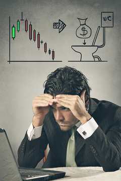 Worried businessman losing on financial markets