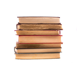 Pile of old books, isolated on white.