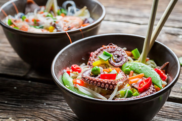 Noodles with vegetables and seafood