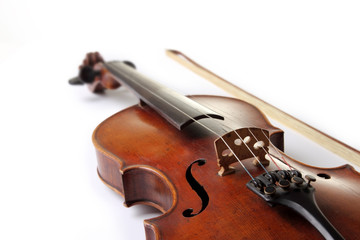 Fototapeta premium Old scratched violin on white background