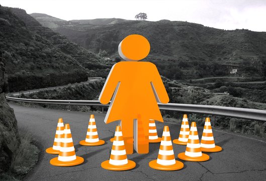 woman sign on a road