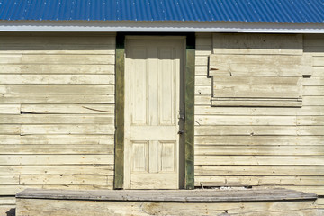 Fototapeta na wymiar Rustic old porch with wooden door