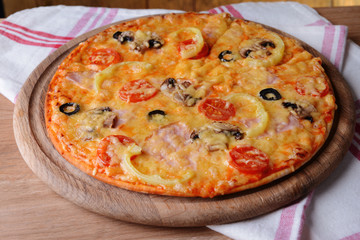 Tasty pizza on table close-up