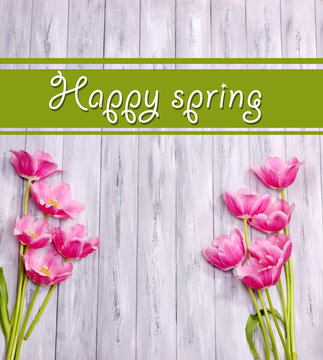 Fototapeta Beautiful flowers on wooden background