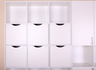 Empty white shelves close up