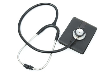 Fototapeta na wymiar stethoscope above a wallet on white background