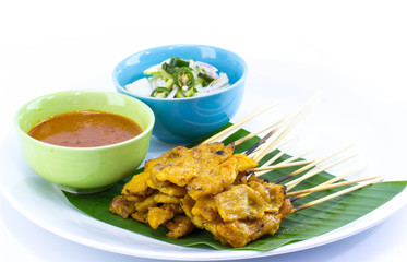 Pork Satay with Peanut Sauce on white background