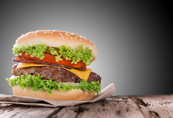 delicious hamburger on wood
