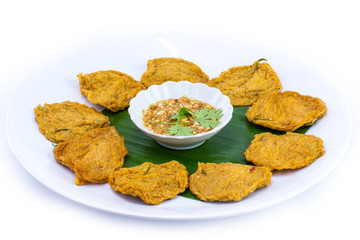 Fried fish patty on white background