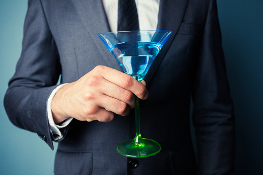 Businessman with cocktail glass