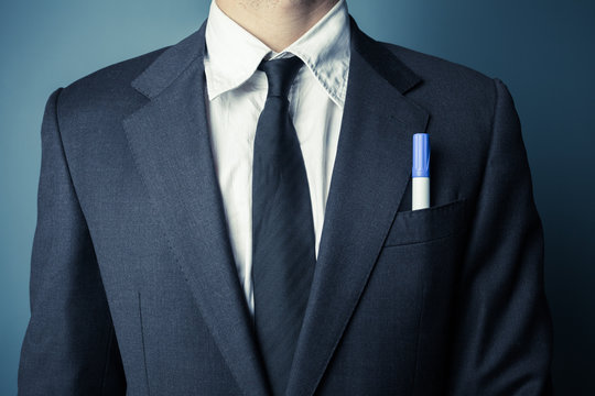 Businessman with a marker in front pocket