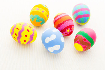 Colourful easter egg on linen background