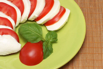 Mozzarella with tomatoes and basil