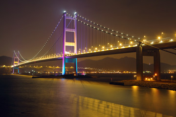 Fototapeta na wymiar Suspension bridge in Hong Kong at night