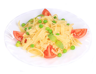 Pasta with green peas on plate close up.