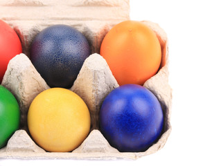 Colorful Easter Eggs in box.
