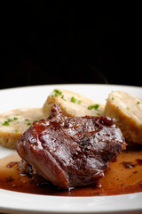 Veal fillet with rich sauce and bread dumplings
