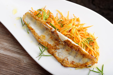 Tasty healthy fish fillet with vegetables