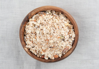 Muesli in a wooden bowl
