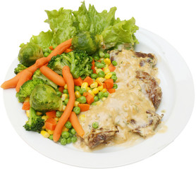 Grilled veal meat and fresh vegetables with mushrooms sauce