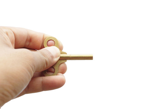 hand holding key on isolated on white background