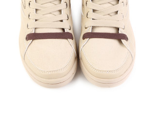 Beige sneakers.