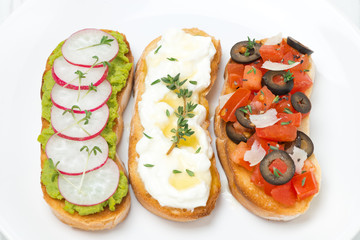 ciabatta with tomatoes, goat cheese, pate with green peas