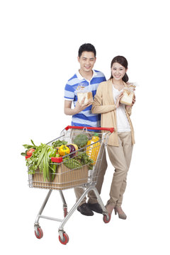 .Young Couple Grocery Shopping.
