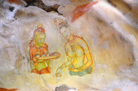 Sigiriya maiden with flowers painting on the rock