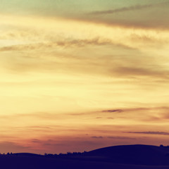 Obraz premium Beautiful sky with clouds at sunset. Filtered image