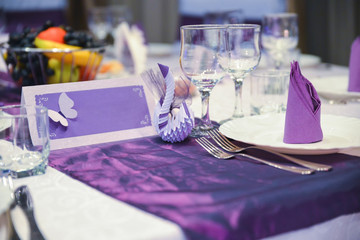 Table with plates and glasses during the wedding
