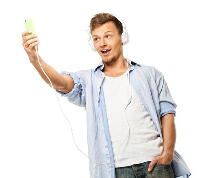 Stylish Happy Man In Headphones Taking Selfie Isolated On White