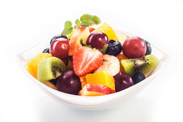 Bowl of colorful tropical fruit salad