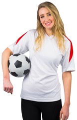 Pretty football fan in white smiling