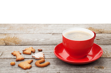 Coffee cup and gingerbread cookies