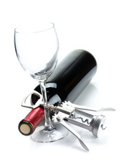 Red wine bottle, glass and corkscrew