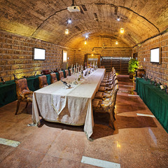 Wine cellar with wine bottle and glasses