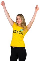 Excited football fan in brasil tshirt