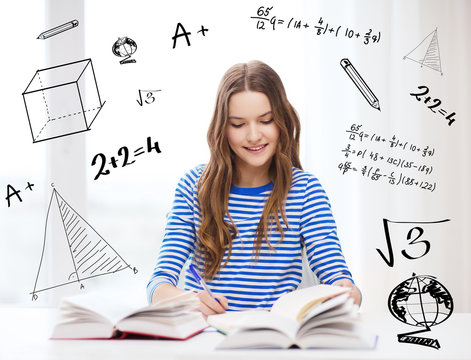 happy smiling student girl with books