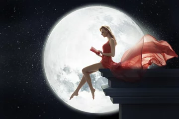 Foto op Plexiglas Volle maan Cute woman over full moon background