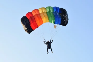 Photo sur Plexiglas Sports aériens parachute with girl
