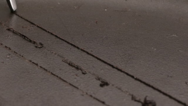 scratching pan teflon surface with a fork