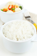 Cooked rice and vegetables close up